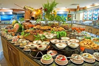 a buffet with a lot of food on it